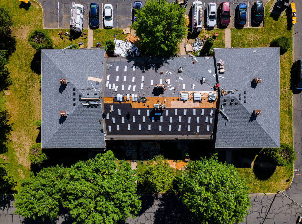 AOS Roof installing a commercial roof for a client