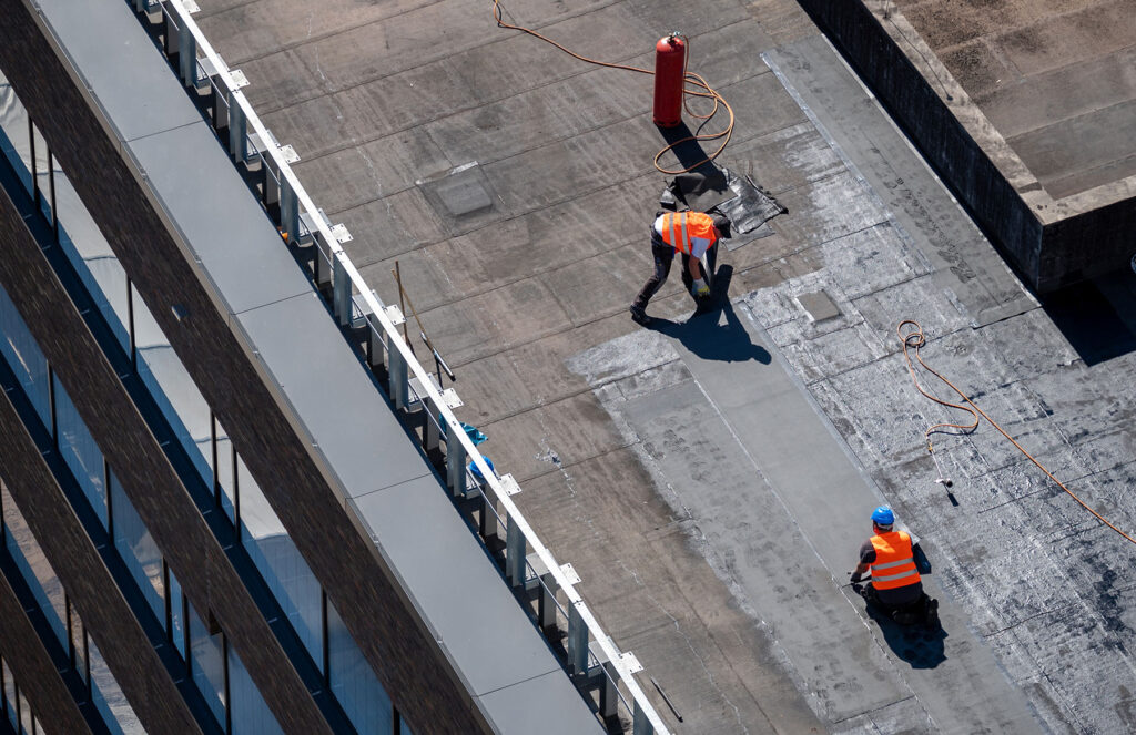 AOS roof providing roof maintenance services