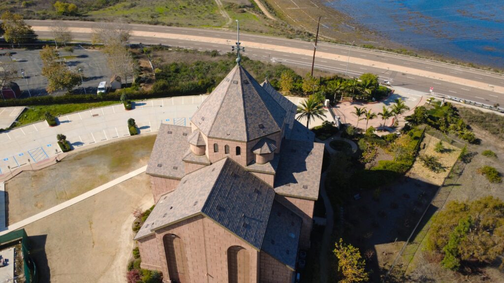 Aerial view of church rooftop and surroundings