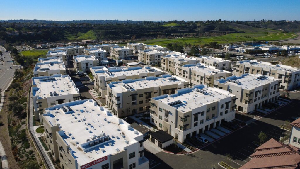Rows of modern three-story residential buildings