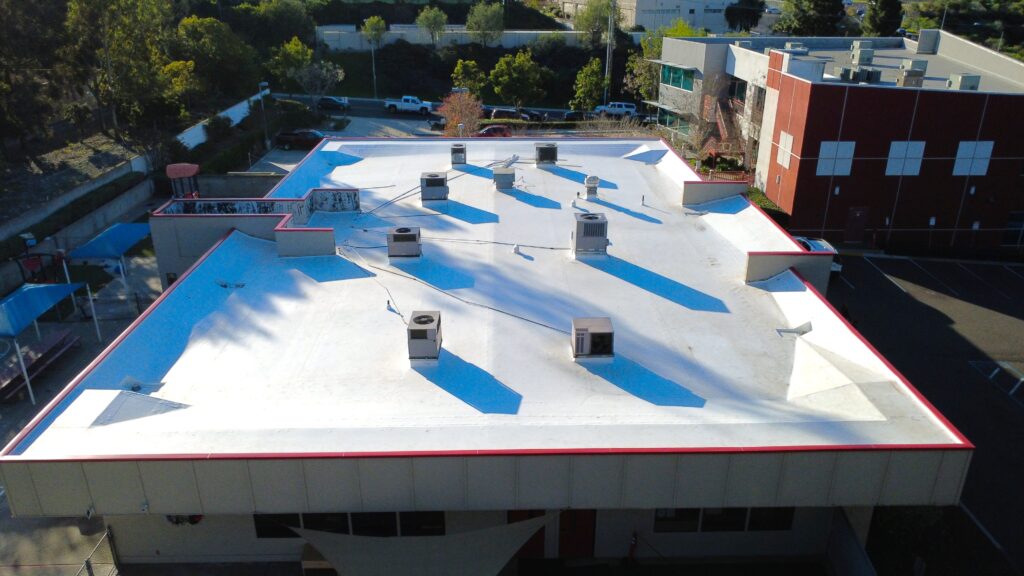 Overhead view of rooftop units and cables