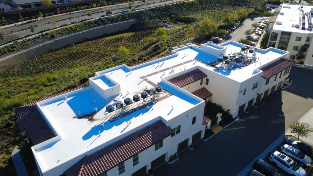 White rooftop with HVAC units visible