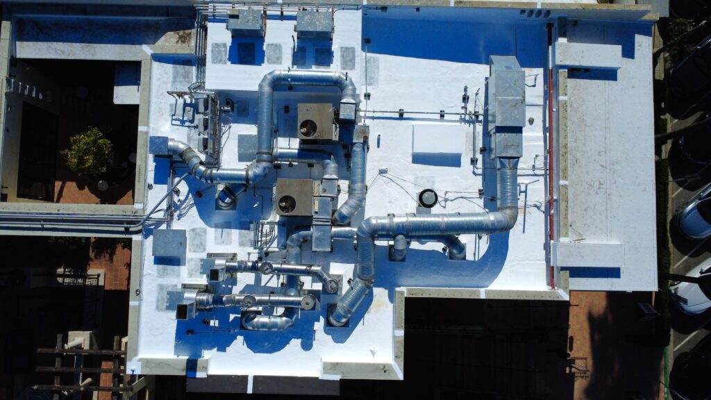 Aerial view of building roof with HVAC ducts